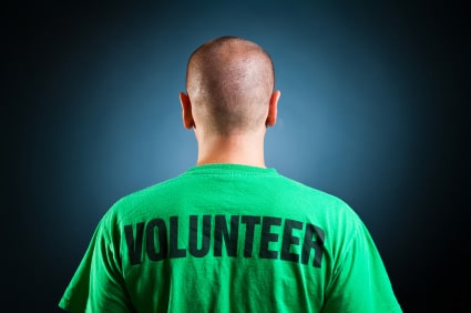 Man in Volunteer Shirt