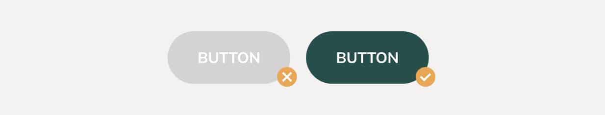 Two buttons: the left one has a light grey background and white text, making it difficult to read. The right one has a dark teal background and white text, which makes it easier to read.
